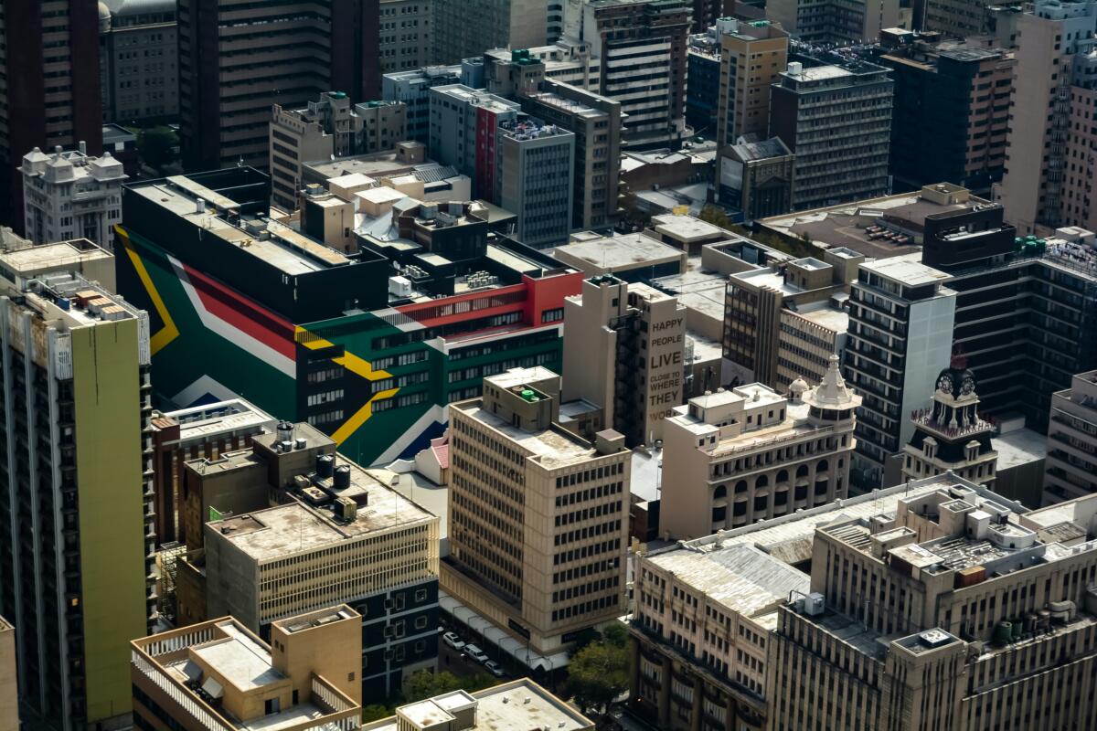 African city skyline and urbanisation driving investment demand